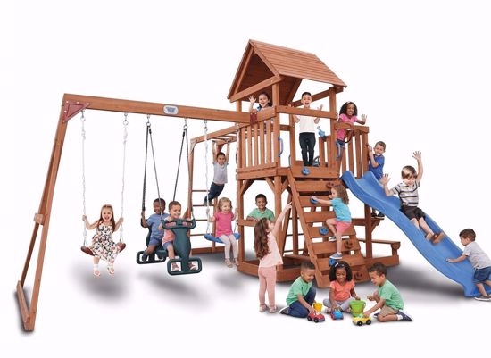Picture of 507/A comprehensive wooden garden playset for children, featuring an elevated playhouse with a wooden roof, a blue wavy slide, a climbing wall, and various swings (a standard swing, a double swing, and a trapeze bar).